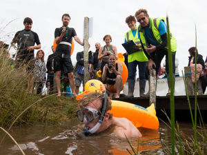 A competitor in the World Bog Snorkelling Championships