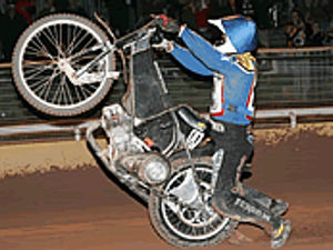 Supporting image for story: Lewis lifts crown after scare