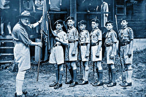 Scouts at the junior county banner in 1957 with the county commissioner