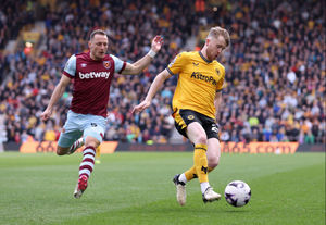 Supporting image for story: Transfer column: Wolves look to former West Ham defender, West Brom in for Liverpool centre-back