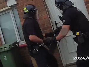 Supporting image for story: Watch: Police bash down door and arrest man in dramatic drugs raid
