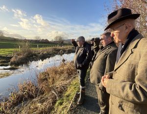 Montgomeryshire and Glyndwr MP Steve Witherden with Glandŵr Cymru regional director Ben Cottam, chair of the Montgomery Canal Partnership John Dodwell, and other guests and Glandŵr Cymru volunteers