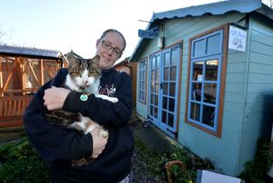 Pongo has a cuddle from Rachael Ashton