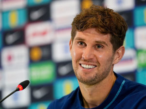 Supporting image for story: John Stones happy to see England's Harry Maguire silence critics