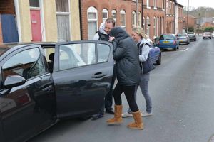 A woman is led away in Lime Street, Walsall