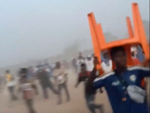 Supporting image for story: Relatives hunt for missing people after deadly Guinea stadium crush