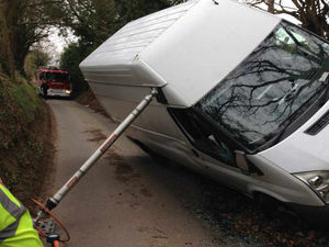 Supporting image for story: Defying gravity: Van's precarious balancing act on road near Telford