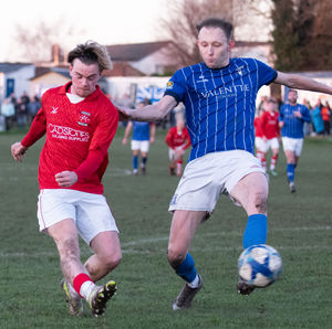 Theo Knight works a shooting opportunity for Whitchurch Alport. (Image by Liam Pritchard)