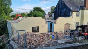 The Old Laundry house in the process of being demolished.
