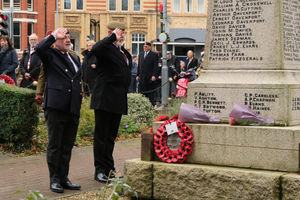 Councillor Jamie Jones lay a wreath for the Royal Anglian Regiment and David Wallace lay a wreath on behalf of the veterans at the cenotaph. Pic by Andy Compton