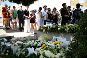 Mourners and floral tributes at the wake of Diogo Jota being held at Sao Cosme Chapel in the town of Gondomar near Porto