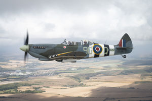 Spitfire MJ627 from the FlyaSpitfire.com Fleet in flight over the english countryside