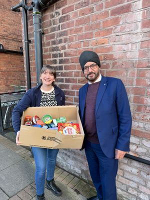 Warinder Juss MP, Member of Parliament for Wolverhampton West and Lucy Cox from the Good Shepherd Fundraising team with some donated goods