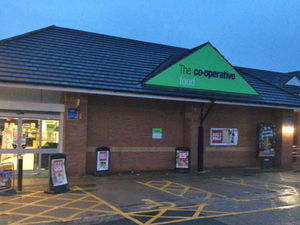 Supporting image for story: Woman hit by crowbar gang in raid on Co-op