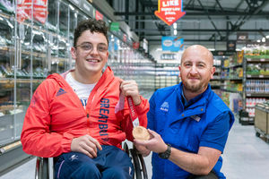 Manager John McDermott and Paralympics GB athlete Harri Jenkins take in the insdie of the new store. Photo: Richard Grange
