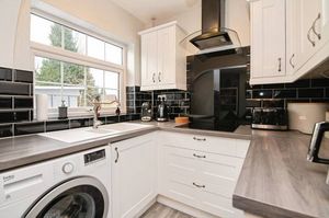 A fitted kitchen and dining space that works well for everyday family life and entertaining