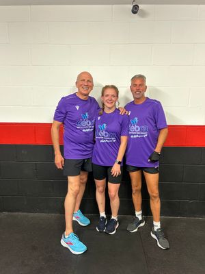 Business owner, Shane (right), partner and coach, Charlotte (centre), and Michael, Coach (left)