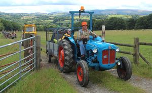 Llanyre's Mike Chandler with his father riding shotgun 