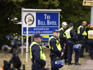 Police outside the former hotel in Epping