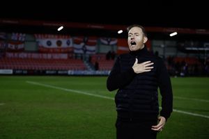 Gavin Cowan celebrates following Shrewsbury Town's win at Salford City