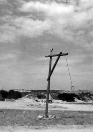 This gibbet was put up at RAF Takali with the warning: "Any man, woman or child, civilian or service personnel, found guilty of sabotage, theft, or in any other way impeding the war effort and subsequently shot, will be hung from this gibbet as a warning to all others."