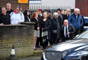 Friends and family of Ken Harris gathered outside the West End Club in Merridale to pay their respects before his funeral and burst into a round of applause. 