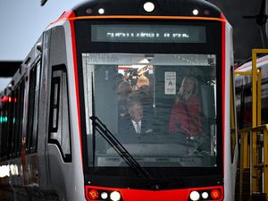Supporting image for story: King drives tram-train as part of his birthday celebrations