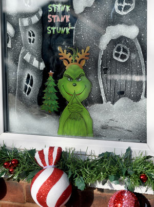 Gavin even sprayed and decorate the windows for that extra Grinchmas feeling