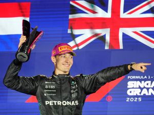 Supporting image for story: McLaren duo collide on opening lap before George Russell wins Singapore GP