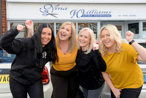 Nina Williams (second right) celebrates with staff Leanne Bailey, Georgia Allen and Olivia Brittle