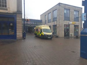 An ambulance was visible outside the Crown Centre on Monday morning