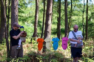 Josh and Max hung baby grows on a washing line in Cannock Chase forest