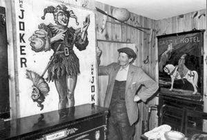 Stafford antique dealer Mr Thomas Timmins had tapped into a thriving market selling pub signs to Australia from his antique shop in Eccleshall in 1977. Pictured with some of the signs is Mr Bill Lindop, who had been helping out in the shop since he retired.