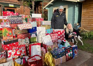 Cheryl presenting the presents to Grinshill Animal Rescue.