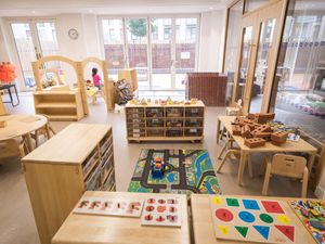 A preschool room with play equipment