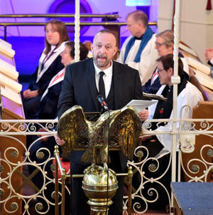 Alan's son Paul Smith speaking at the service