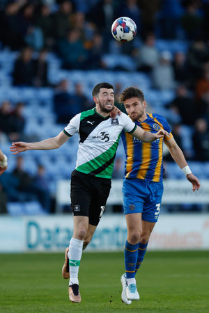 Luke Leahy of Shrewsbury Town and Matt Butcher of Plymouth Argyle (AMA)