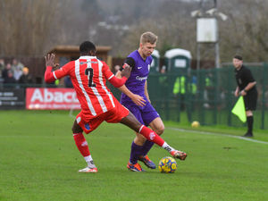 Derby loanee Harry Hawkins tries to get forward