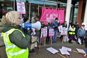 UCU's regional official Anne O'Sullivan (left) rallies the protesters