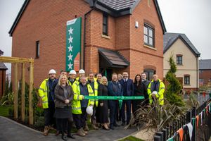 Joe Turner, Managing Director for Persimmon Homes West Midlands, alongside Elaine Brown, Sales Director, joined by colleagues from across Persimmon West Midlands
