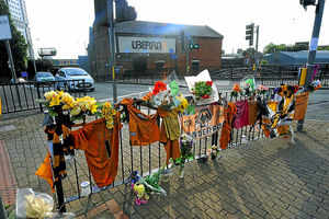 Floral tributes to Tom Kirwan outside the Uberra nightclub in Wolverhampton