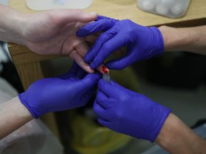 Supporting image for story: Lower vaccine uptake among people with prior Covid-19 infection – study
