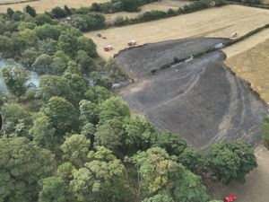 Supporting image for story: New pictures of charred crops reveal scale of huge wildfire in field on Shropshire/Staffordshire border