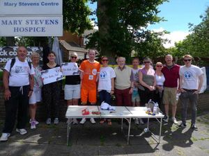 Bob with supporters outside Mary Stevens Hospice, one of the charities he has raised money for