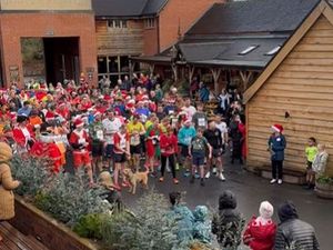 Supporting image for story: Santa suits and Christmas trees fill the streets for Market Drayton's annual Turkey Trot