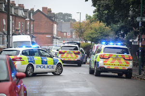 Police cars at the scene where the suspect was detained. Photo: SnapperSK
