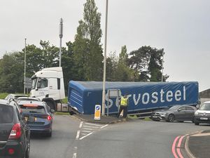 Supporting image for story: Traffic chaos after lorry sheds load on roundabout at entrance to Dudley hospital