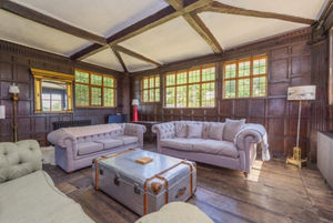 The living room/drawing room at Penkridge Hall, for sale via Samuel Wood.