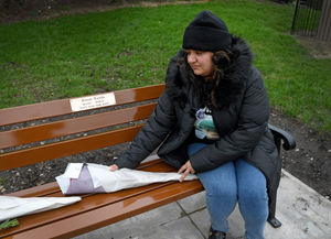 ..Ronan's mum Pooja with flowers on the bench..