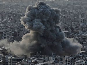 Smoke rising after an Israeli airstrike on Dahiyeh in the southern suburb of Beirut